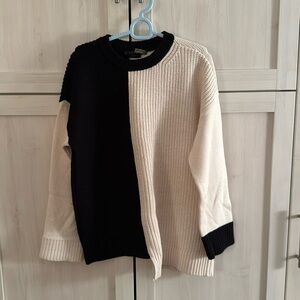 Alice + Olivia black and white sweater; size small.